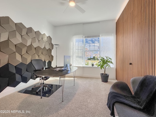 office space featuring ceiling fan and carpet