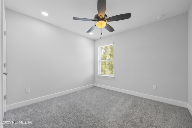 carpeted empty room with ceiling fan