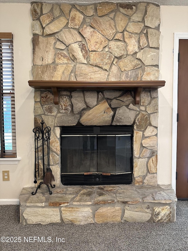 interior details featuring a fireplace