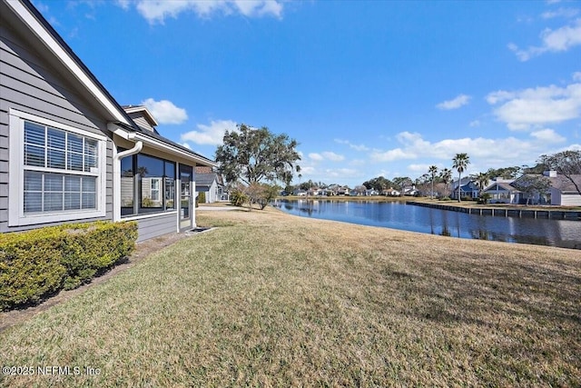 view of yard with a water view