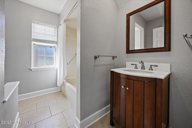 bathroom with tile patterned flooring, vanity, and shower / tub combo with curtain