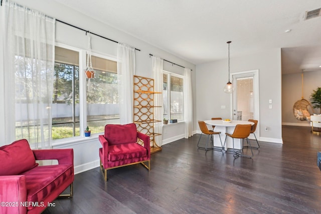 sitting room featuring dark hardwood / wood-style flooring