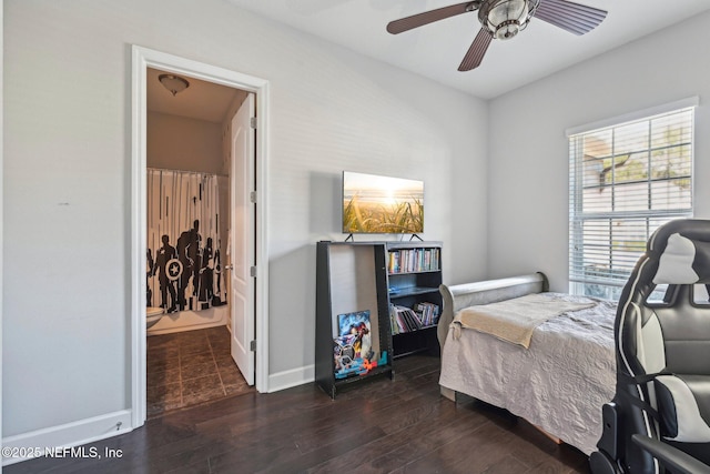 bedroom with dark wood-type flooring and ceiling fan