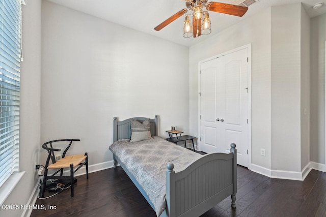 bedroom featuring dark wood-type flooring and ceiling fan