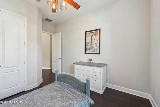 bedroom featuring dark wood-type flooring