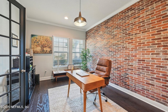 office area featuring crown molding, dark hardwood / wood-style floors, and brick wall