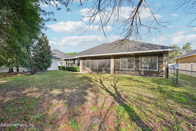 view of yard with a sunroom