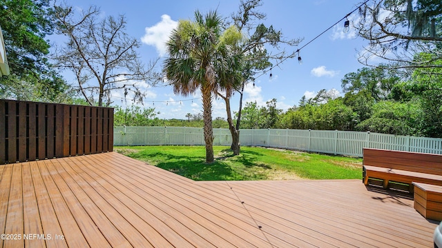 deck featuring a yard