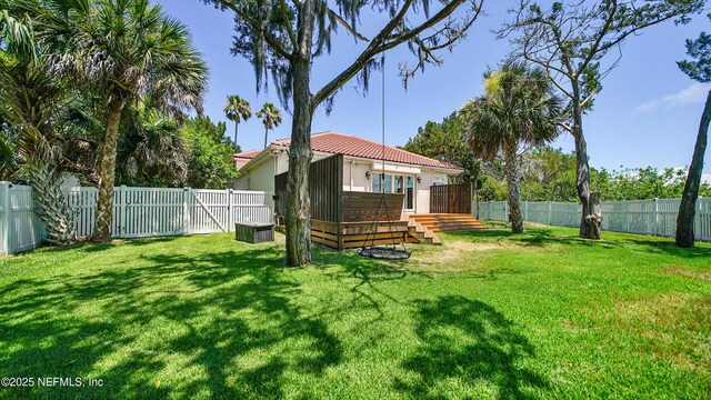 view of yard featuring a wooden deck