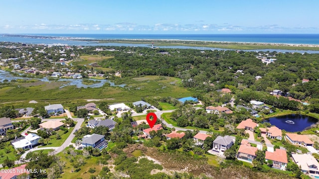 drone / aerial view with a water view