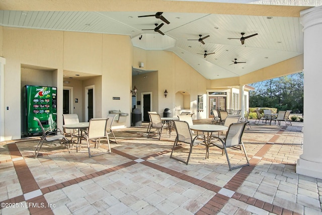 view of patio featuring ceiling fan