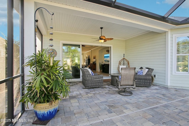 view of patio / terrace featuring ceiling fan