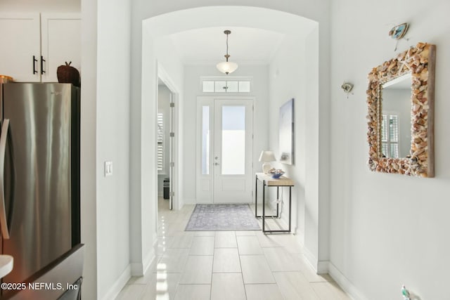 view of tiled foyer entrance