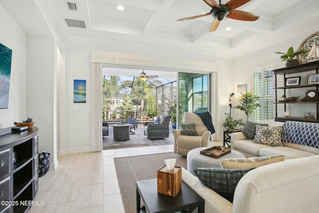 living room featuring beamed ceiling, plenty of natural light, coffered ceiling, and light tile patterned floors