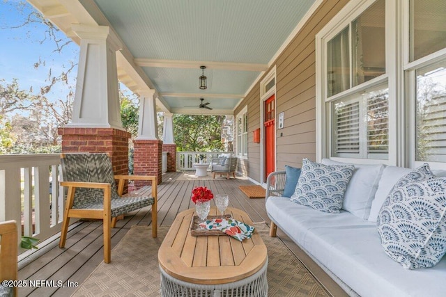 wooden terrace featuring covered porch