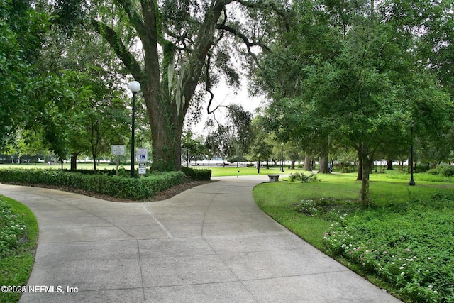 view of home's community featuring a yard