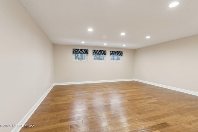 spare room featuring light hardwood / wood-style flooring