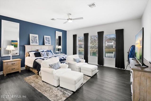 bedroom featuring dark wood-type flooring and ceiling fan