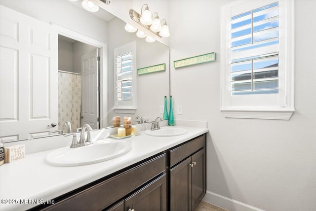 bathroom featuring vanity and plenty of natural light