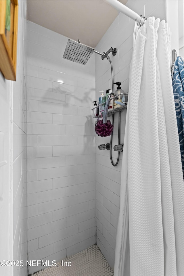 bathroom featuring walk in shower