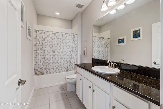 full bathroom featuring toilet, tile patterned floors, shower / bathtub combination with curtain, and vanity