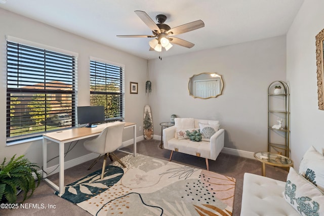 carpeted home office with ceiling fan