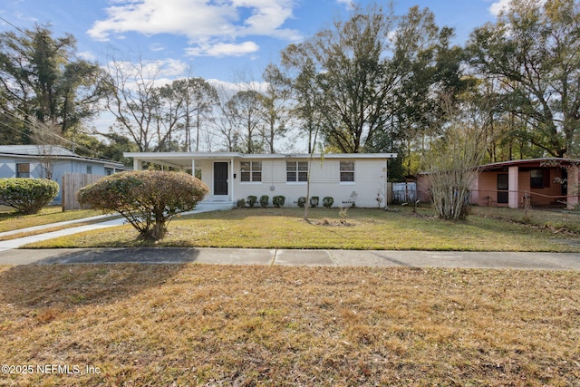 ranch-style home with a front yard