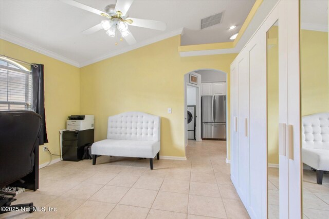 office area featuring ornamental molding, arched walkways, visible vents, and light tile patterned floors