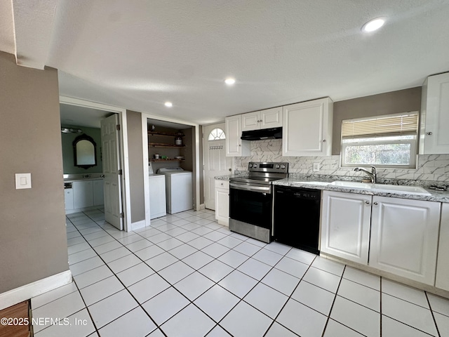 kitchen with white cabinets, washing machine and dryer, black dishwasher, and stainless steel electric range oven