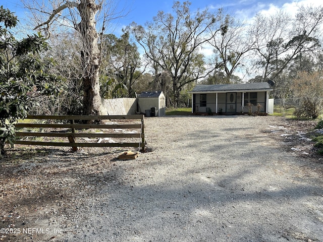 view of yard with a storage shed