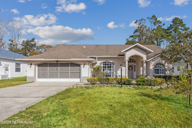 ranch-style home with a garage and a front yard