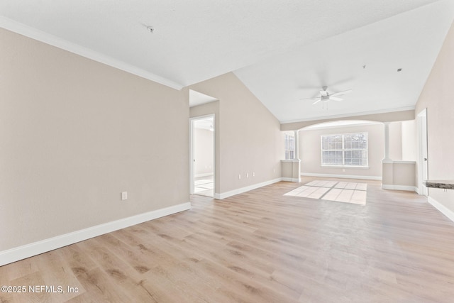 unfurnished living room with crown molding, light hardwood / wood-style flooring, decorative columns, and ceiling fan