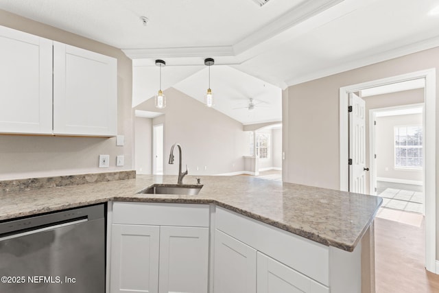 kitchen with sink, white cabinetry, stainless steel dishwasher, kitchen peninsula, and pendant lighting