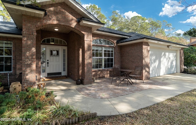 entrance to property with a garage