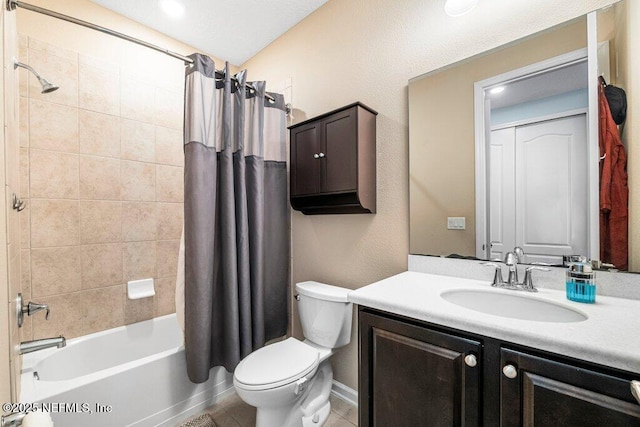 full bathroom featuring tile patterned flooring, vanity, shower / bathtub combination with curtain, and toilet