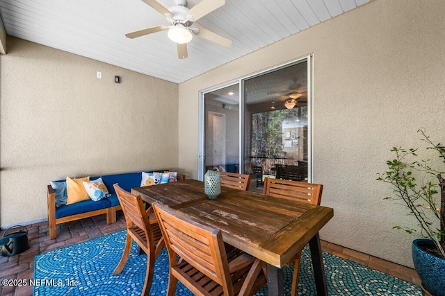 dining room featuring ceiling fan