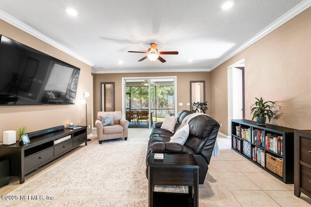 living room featuring crown molding, light tile patterned floors, ceiling fan, and a textured ceiling