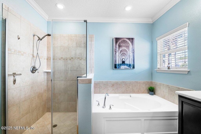 bathroom featuring vanity, ornamental molding, shower with separate bathtub, and a textured ceiling