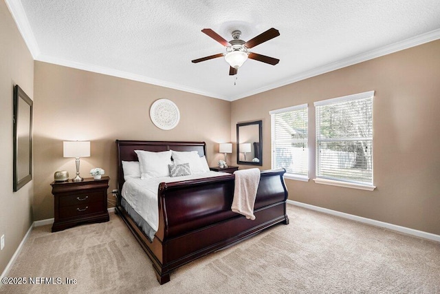 bedroom with light carpet, ceiling fan, crown molding, and a textured ceiling