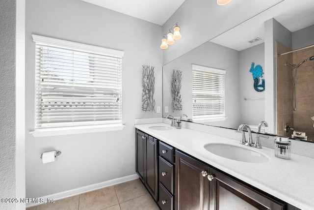 bathroom with vanity and tile patterned floors