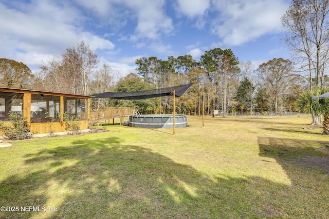54110 Marlee Rd, Callahan, FL 32011 - view of yard featuring a fenced in pool and a sunroom