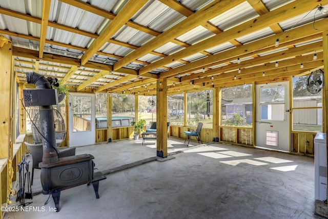 54110 Marlee Rd, Callahan, FL 32011 - unfurnished sunroom with a wood stove