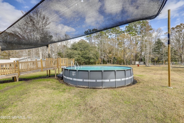 54110 Marlee Rd, Callahan, FL 32011 - view of swimming pool featuring a lawn