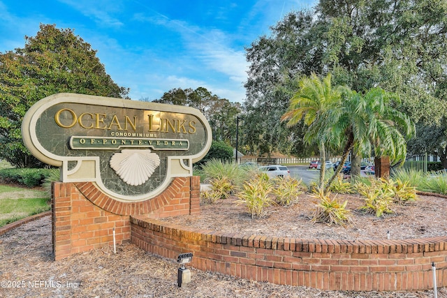 view of community sign