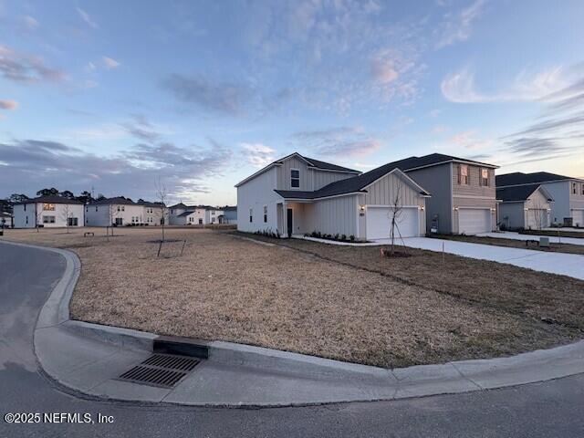 view of front of property with a garage