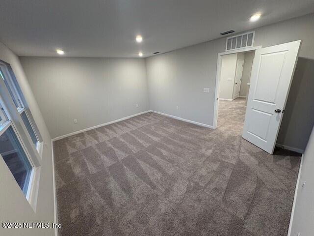 spare room with carpet