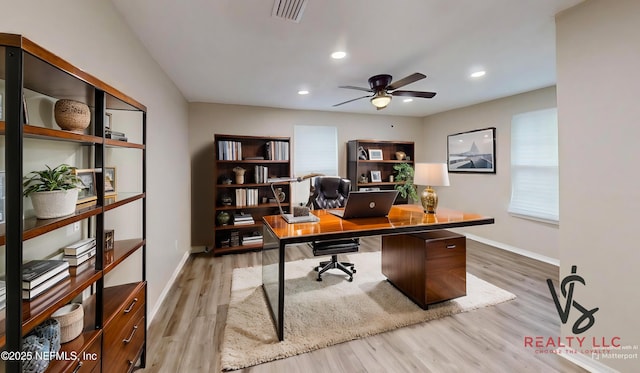 office area featuring ceiling fan and light wood-type flooring