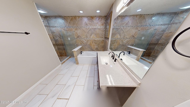 bathroom with separate shower and tub, sink, and tile walls