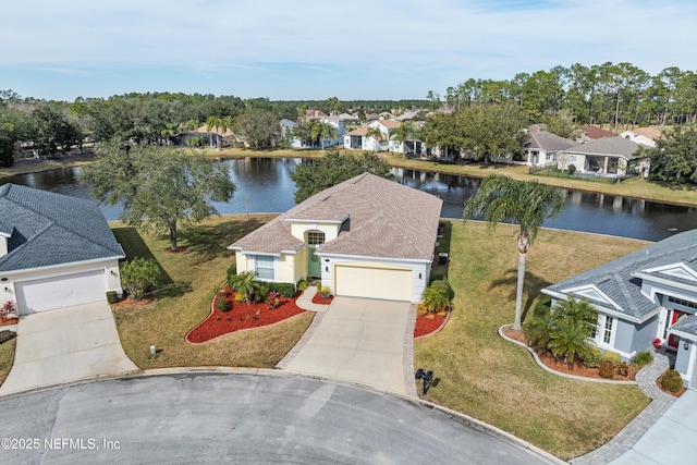 drone / aerial view featuring a water view