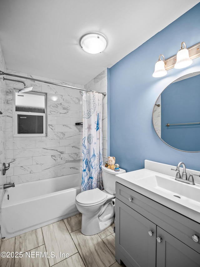 full bathroom featuring vanity, toilet, and shower / bath combo